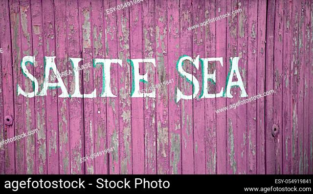 Salte Sea word printed on old distressed planks