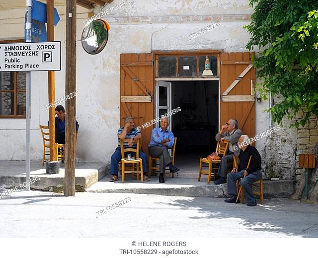 Lefkara Cyprus Men Outside Cafe by Road Sign with Dual Language