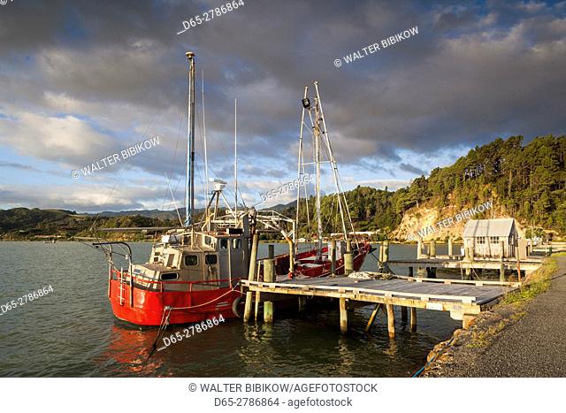 New Zealand, North Island, Coromandel Peninsula, Coromandel Town, commercial wharf, sunset