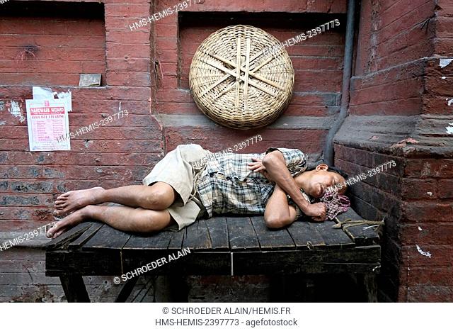 India, West Bengal State, Calcutta, people sleeping, day and night, alone or in groups, are an integral part of the Indian landscape