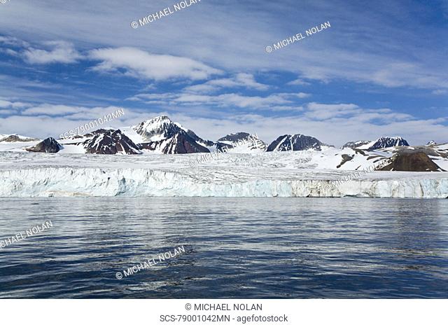 A view of the tidewater glacier in Isbukta Ice Bay on the western side of Spitsbergen Island in the Svalbard Archipelago, Barents Sea
