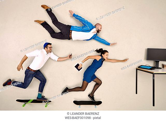 Modern business colleagues flying and skateboarding towards office desk