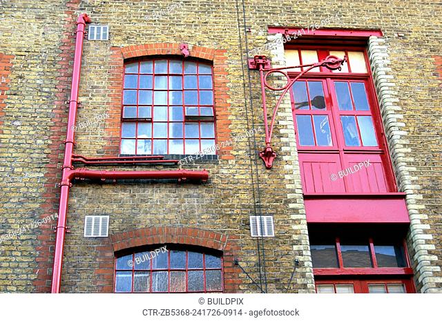 London regeneration. Victorian warehouses in the dockland area reconverted in expensive flats
