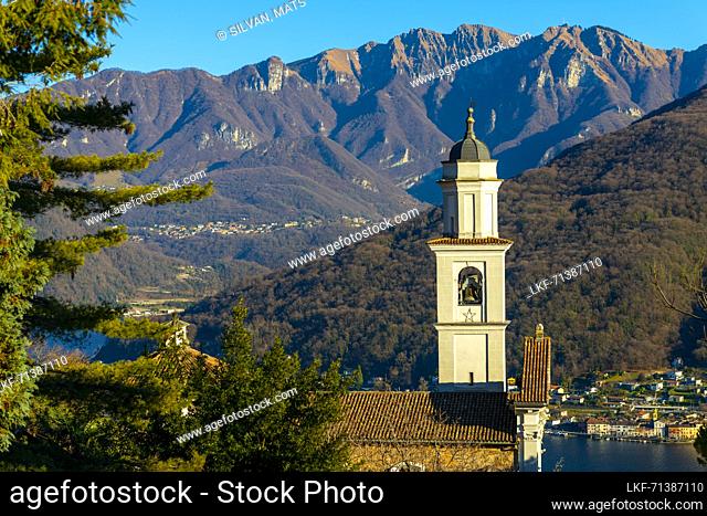 Church of Saints Fedele and Simone and Lake Lugano with Mountain in a Sunny Day in Vico Morcote, Ticino in Switzerland