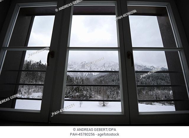 View of the Wetterstein mountain range from the bathroom of a room of the hotel Schloss Elmau in Kruen, Germany, 24 January 2014