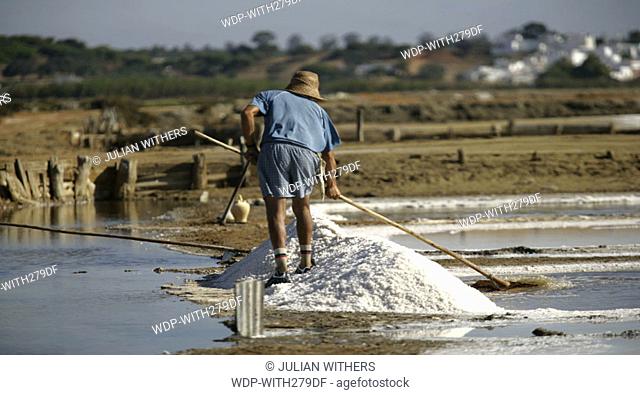 Desternation Spain /Isla Christina salt fields, gathering the salt