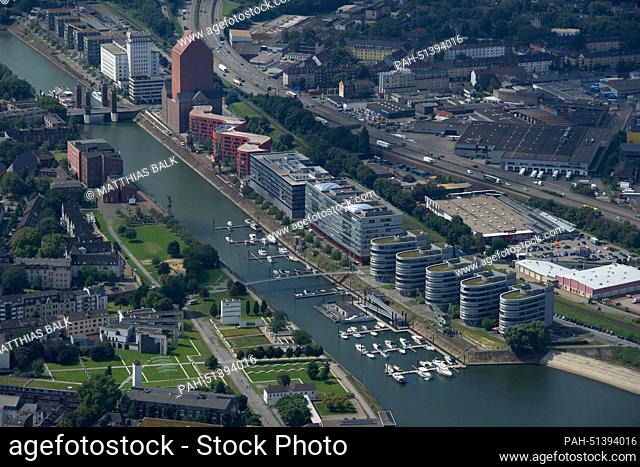 Duisburg Inner Harbour in Duisburg, Germany, on 21 August 2014. The office complex Five Boats can be seen front right, whole the Landesarchiv...