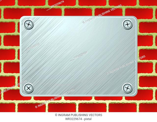 silver metal plate with screw on red brickwall
