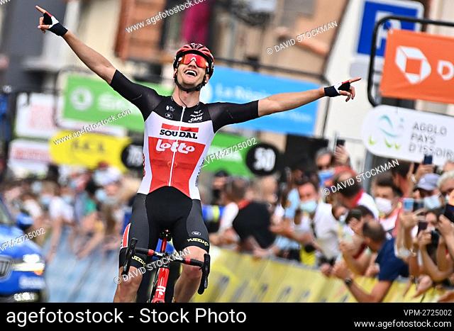 Belgian Brent Van Moer of Lotto Soudal celebrates as he crosses the finish line to win the first stage of the 73st edition of the Criterium du Dauphine cycling...