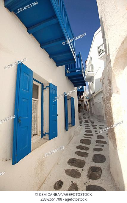 Whitewashed houses with colorful balconies and windows in the alleys of town, Mykonos, Cyclades Islands, Greek Islands, Greece, Europe