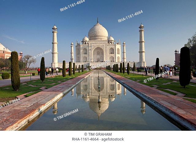The Taj Mahal mausoleum southern view with reflecting pool and cypress trees, Uttar Pradesh, India