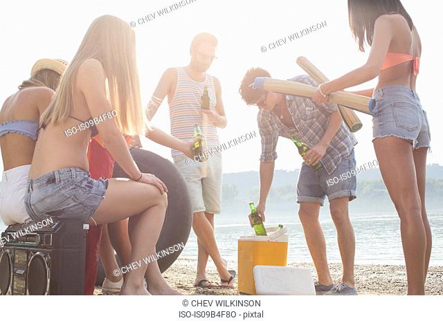 Group of friends enjoying beach party