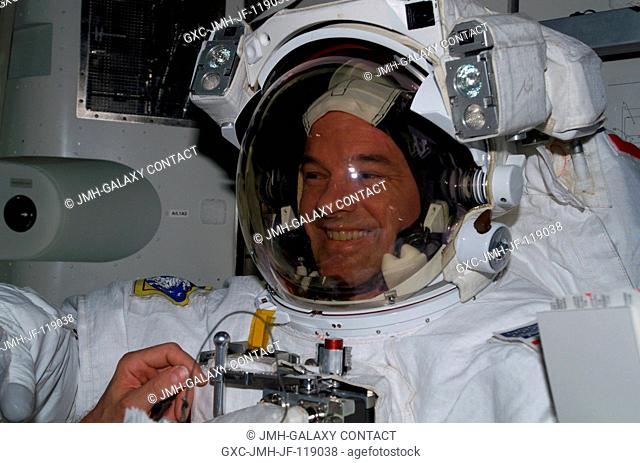 Attired in his Extravehicular Mobility Unit (EMU) space suit, astronaut Jeffrey N. Williams, Expedition 13 NASA space station science officer and flight...