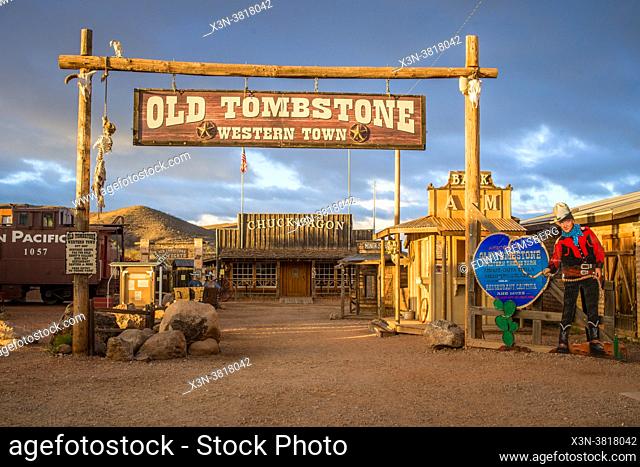 Welcome sign for the town of Tombstone at sunset, Arizona