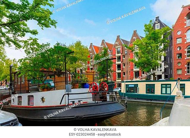 Amsterdam canal with picturesque houseboats, Holland, Netherlands