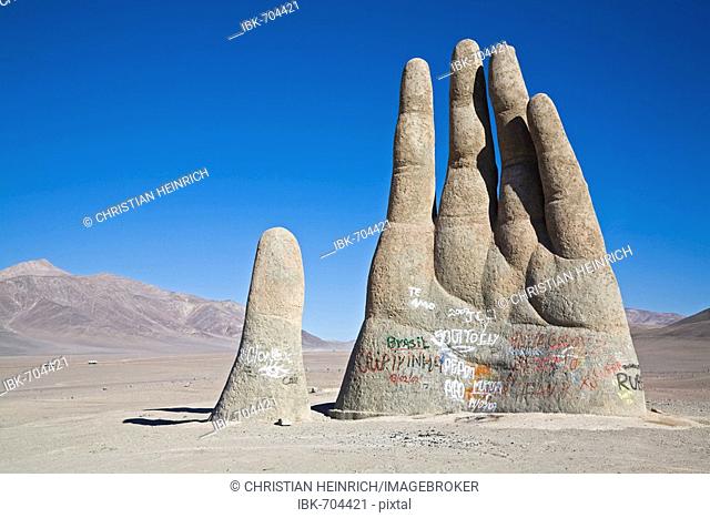 Mano del Desierto is a large-scale sculpture of a hand, Atacama Desert, Chile, South America