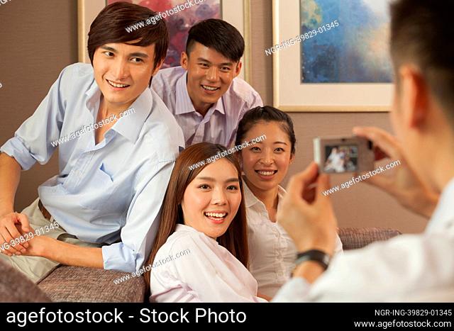 Team of business people taking a picture