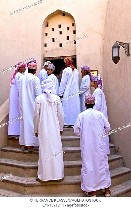Omanian students at the Nizwa fort, Sultanate of Oman