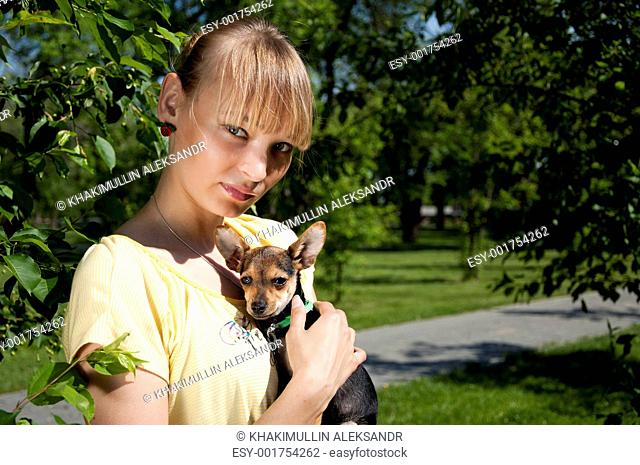 Portrait of the girl and small dog