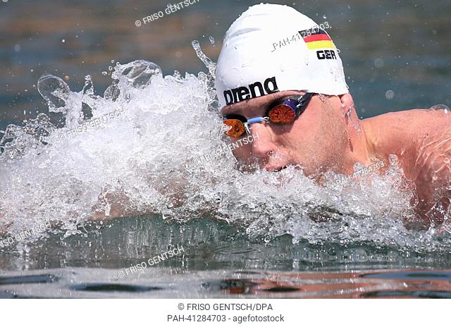 Christian Reichert of Germany swims during the team's 5 km Marathon Open Water event of the 15th FINA Swimming World Championships at Moll de la Fusta on the...