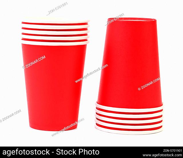 Pile of colorful paper coffee cup. Close up. White background