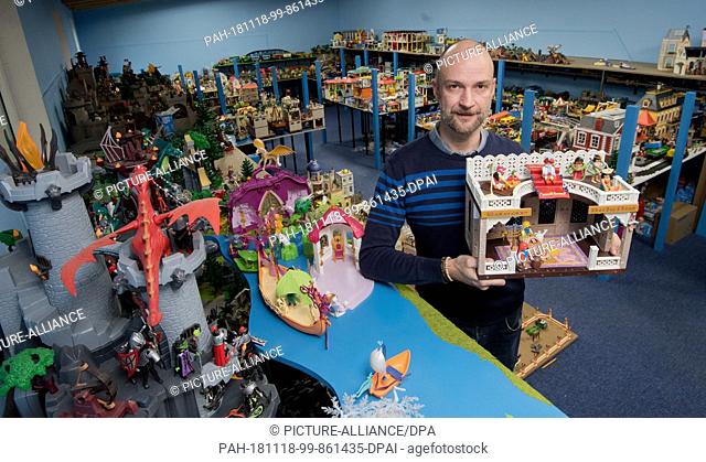 07 November 2018, Lower Saxony, Hannover: Robert Packeiser is standing in his Playmobil workshop. The 46-year-old teacher recreates theme worlds from various...