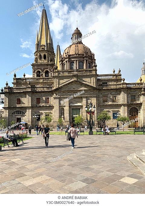 Plaza de Armas with Catedral de Guadalajara (Guadalajara Cathedral) in the background. Guadalajara (GDL), Jalisco, Mexico