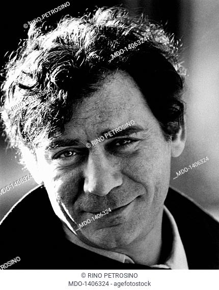 Portrait of italian actor Gian Maria Volontè smiling. Portrait of italian actor Gian Maria Volontè photographed in a close up while smiling