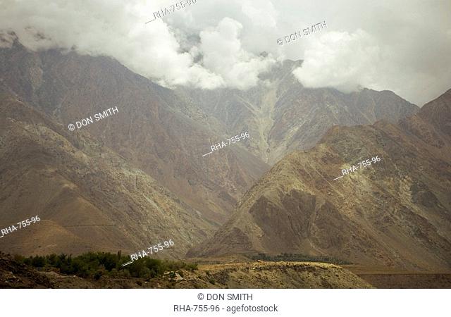 Dramatic summer monsoon clouds over the Karakoram ranges, Karakoram Highway, Northern areas, Pakistan, Asia