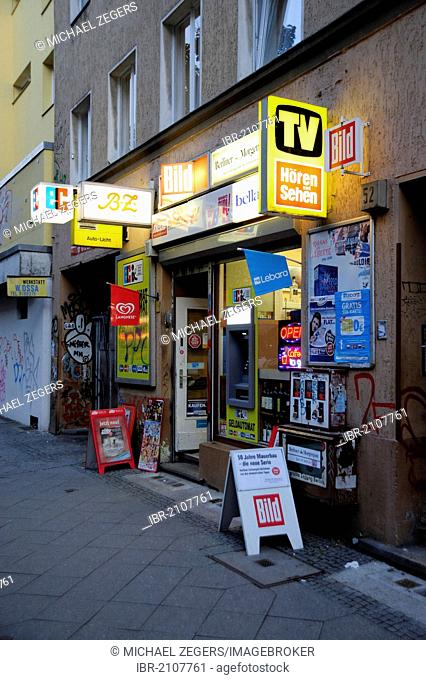 Advertising and billboards on a kiosk in Kreuzberg Schlesisches Tor, Berlin, Germany, Europe