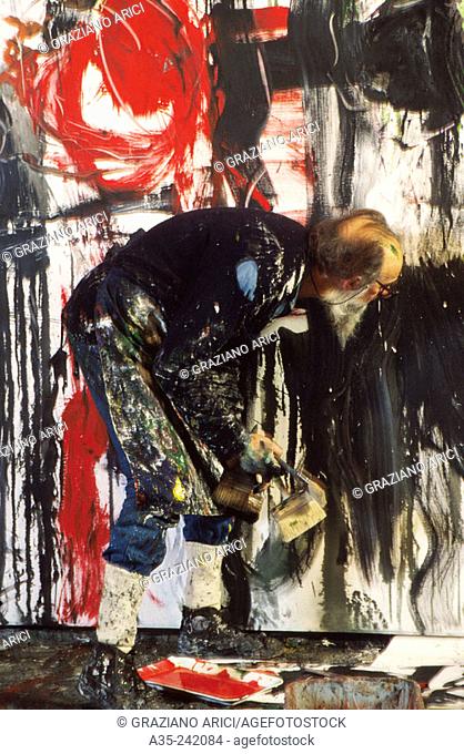 Emilio Vedova, Italian painter, working at his studio, 1987