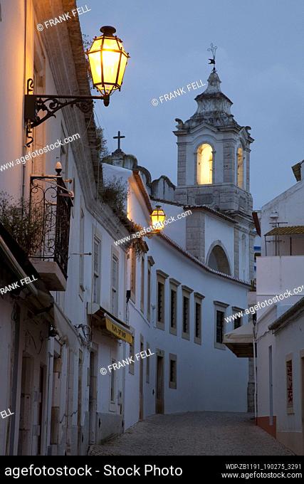 Portugal, Algarve, Lagos, Street & Igreja de Santo Antonio at Dusk