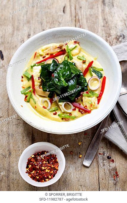 Raw vegetable Thai curry with coconut and spinach