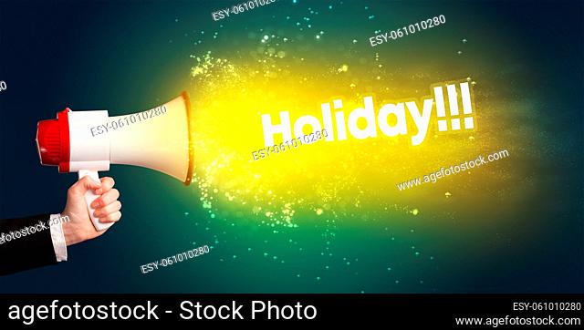 Young woman yelling to loudspeaker with Holiday!!! inscription, modern media concept