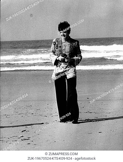 May 24, 1967 - Newquay, Wales, U.K. - Singer/Songwriter, PAUL MCCARTNEY member of the famous pop group 'The Beatles' walking along the beach in Wales