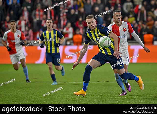 Fenerbahce's Attila Szalai, left and Slavia's Ivan Schranz in action during the Europa Conference League second round return match between Slavia Prague and...