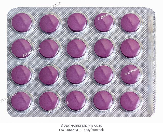 Medicine pills packed in blisters isolated