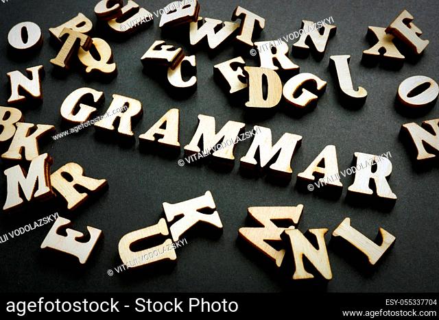 Grammar word from wooden letters. Learn English concept