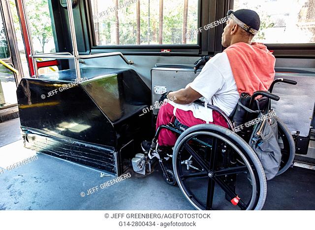 New York, New York City, NYC, Roosevelt Island, MTA public bus, Black, man, wheelchair, disabled, rider