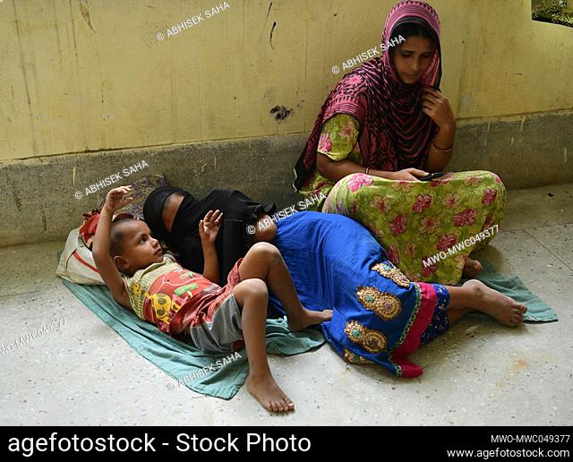 Food victims given shelter at a temporary relief camp at a school in Agartala. Tripura, India