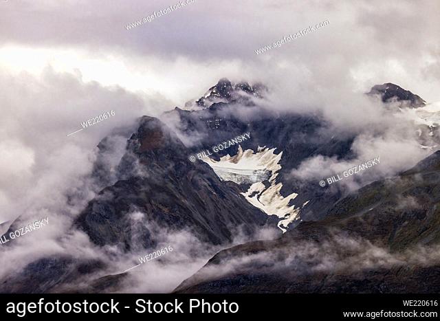 Cloudy mountain peaks - Glacier Bay National Park and Preserve, near Juneau, Alaska, USA