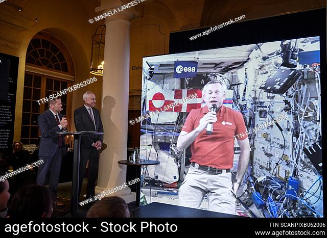 Nobel laureates Ferenc Krausz and Moungi G. Bawendi talk with Danish ESA astronaut Andreas Mogensen, as the Nobel Prize Museum in Stockholm is connected to the...