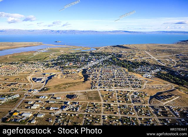 Aerial view of El Calafate, a sprawing town on the coast, a sea channel, on the edge of the Southern Patagonian Ice Field