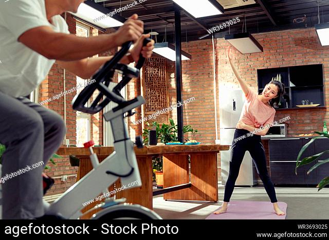 Young couples to exercise at home