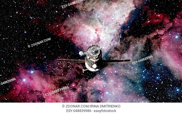 Spacecraft Progress orbiting the earth. Elements of this image furnished by NASA