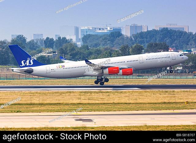 An Airbus A340-300 aircraft of SAS Scandinavian Airlines with registration OY-KBD at Beijing Airport (PEK), Beijing, China, Asia