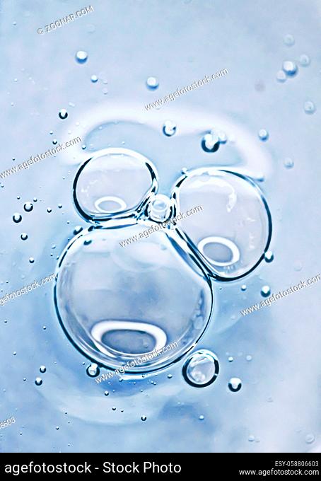 Transparent gel cream bubbles as cosmetics background, hygiene and science closeup