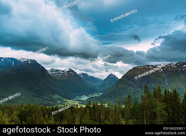 Byrkjelo Village, Sogn Og Fjordane County, Norway. Beautiful Sky Above Norwegian Rural Landscape. Bergheimsvatnet Lake In Summer Day