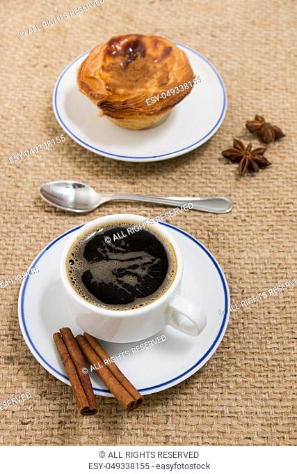 Typical Portuguese breakfast with expresso coffee and egg custard pastry