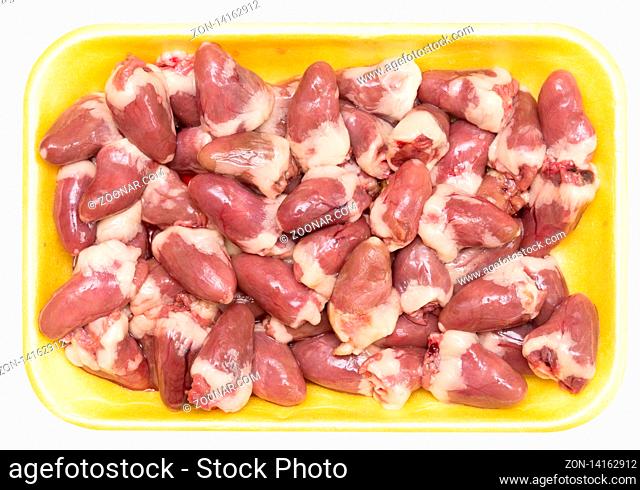 Raw chicken hearts in a plastic tray